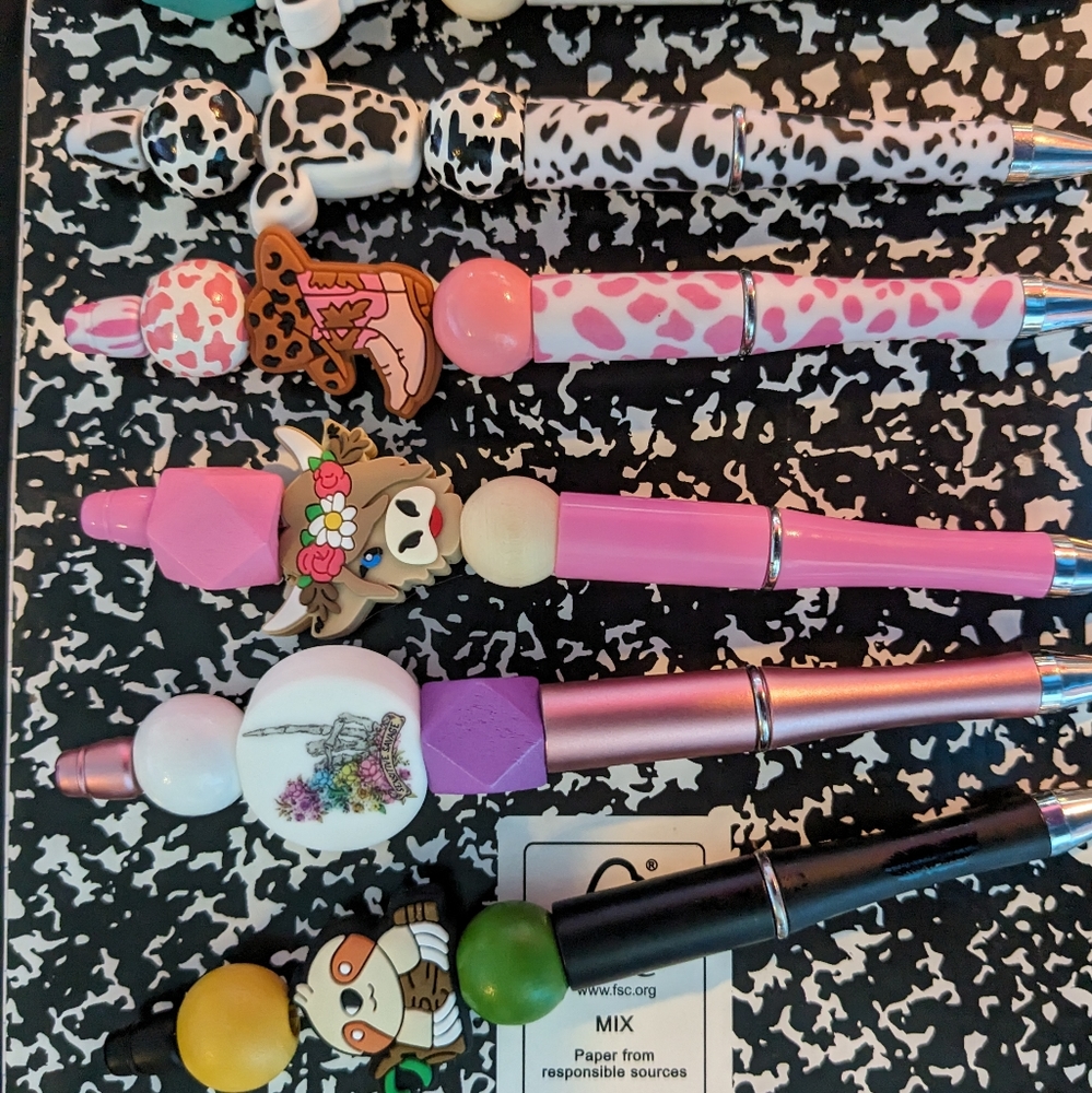 Beaded ink pens